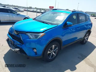 2018 Toyota RAV4 XLE with VIN JTMWFREV2JJ168557, listed as a IAAI auction lot 41994837 with 107,636 mi miles. Bid and sale history available at carsss.com. Image 2.