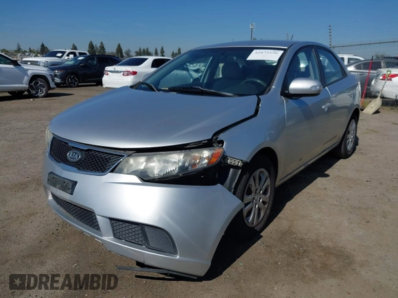 2010 Kia Forte EX with VIN KNAFU4A2XA5097831, listed as a IAAI auction lot 41872156 with 168,081 mi miles. Bid and sale history available at carsss.com. Image 2.
