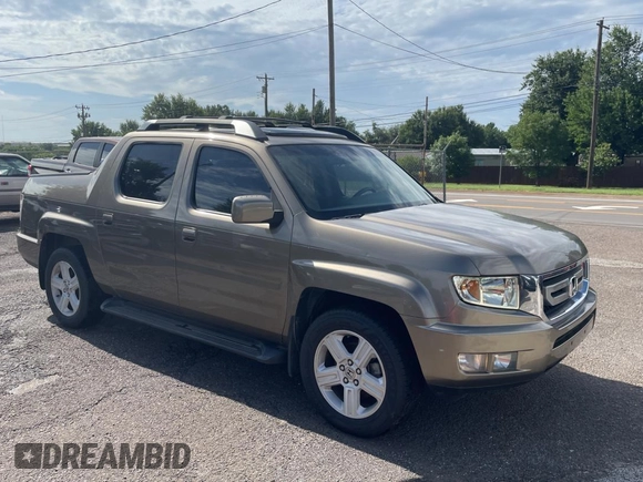 2009 Honda Ridgeline RTL with VIN 2HJYK16539H500759, listed as a Copart auction lot 63874225 with 123,508 mi miles and Clean title. Bid and sale history available at DreamBid. Image 1.