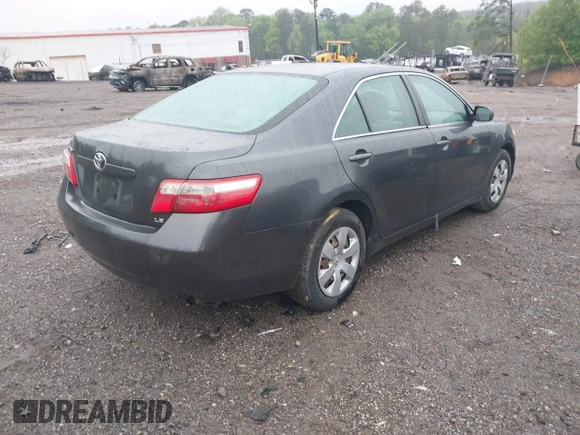 2007 Toyota Camry CE with VIN 4T1BE46K77U129152, listed as a IAAI auction lot 42107149 with 203,722 mi miles and . Bid and sale history available at DreamBid. Image 4.