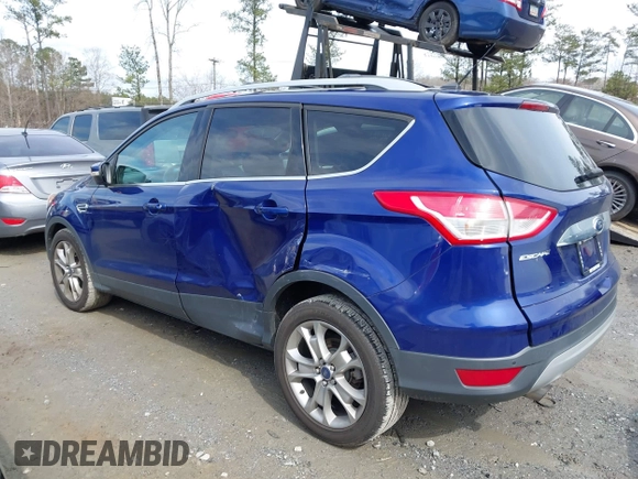2016 Ford Escape Titanium with VIN 1FMCU9JXXGUA71898, listed as a IAAI auction lot 41758284 with 51,935 mi miles. Bid and sale history available at carsss.com. Image 14.