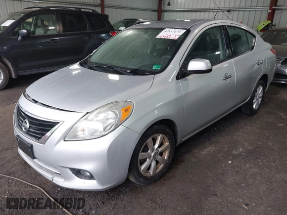 2012 Nissan Versa SV with VIN 3N1CN7AP1CL928493, listed as a IAAI auction lot 42417672 with 140,687 mi miles and . Bid and sale history available at DreamBid. Image 2.