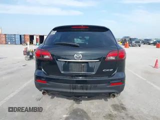 2015 Mazda CX-9 Grand Touring z VIN JM3TB2DA1F0456773, wystawiony jako IAAI lot #42257555 z przebiegiem 152 890 mil mil oraz . Historia ofert i sprzedaży dostępna na DreamBid. Obrazek 16.
