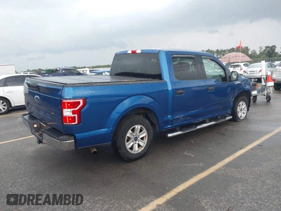 2018 Ford F-150 XL with VIN 1FTEW1CB2JFC79764, listed as a IAAI auction lot 42378319 with 69,571 mi miles and . Bid and sale history available at DreamBid. Image 4.