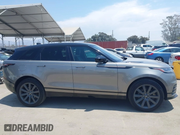 2019 Land Rover Range Rover Velar R-Dynamic SE z VIN SALYL2EX8KA784025, wystawiony jako IAAI lot #42786648 z przebiegiem 75 780 mil mil oraz . Historia ofert i sprzedaży dostępna na DreamBid. Obrazek 13.