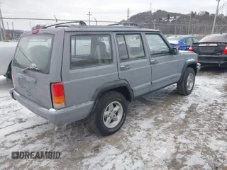 1999 Jeep Cherokee Sport with VIN 1J4FT68S1XL511195, listed as a IAAI auction lot 41651025 with Not provided miles and . Bid and sale history available at DreamBid. Image 4.