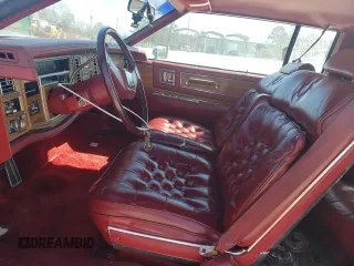 1981 Cadillac Eldorado z VIN 1G6AL5799BE635997, wystawiony jako Copart lot #45287175 z przebiegiem 46 416 mil mil oraz Czysty tytuł • Clean title. Historia ofert i sprzedaży dostępna na DreamBid. Obrazek 7.