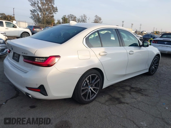 2022 BMW 3 Series 330i with VIN 3MW5R1J04N8C56510, listed as a IAAI auction lot 41458542 with 62,022 mi miles. Bid and sale history available at carsss.com. Image 4.