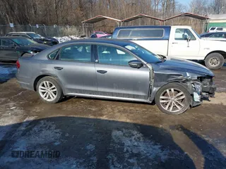 2019 Volkswagen Passat 2.0T Wolfsburg Edition with VIN 1VWLA7A37KC012589, listed as a IAAI auction lot 41394161 with 97,652 mi miles. Bid and sale history available at carsss.com. Image 13.
