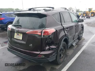 2018 Toyota RAV4 LE with VIN 2T3BFREV9JW857284, listed as a IAAI auction lot 42448480 with 85,551 mi miles and . Bid and sale history available at DreamBid. Image 4.
