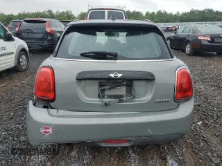 2016 MINI Hardtop 4 Door with VIN WMWXU1C53G2D08231, listed as a Copart auction lot 61050035 with 128,267 mi miles and Salvage title. Bid and sale history available at DreamBid. Image 6.