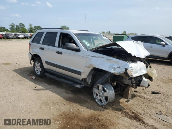 2005 Jeep Grand Cherokee Laredo z VIN 1J4GR48KX5C581833, wystawiony jako Copart lot #60975355 z przebiegiem 149 993 mil mil oraz Szkoda całkowita • Salvage title. Historia ofert i sprzedaży dostępna na DreamBid. Obrazek 4.