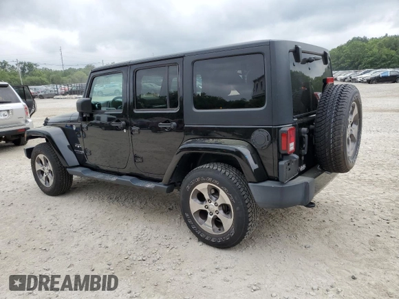 2018 Jeep Wrangler JK Unlimited Sahara with VIN 1C4HJWEG3JL921167, listed as a Copart auction lot 57310714 with 59,110 mi miles and Salvage Title. Bid and sale history available at carsss.com. Image 2.