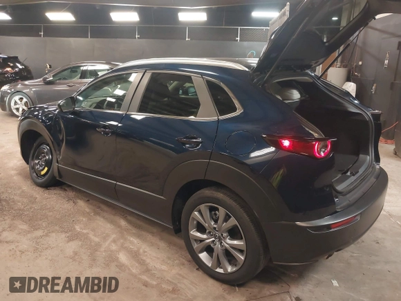 2024 Mazda CX-30 S Preferred z VIN 3MVDMBCM9RM700673, wystawiony jako IAAI lot #42417844 z przebiegiem 7 385 mil mil oraz . Historia ofert i sprzedaży dostępna na DreamBid. Obrazek 3.
