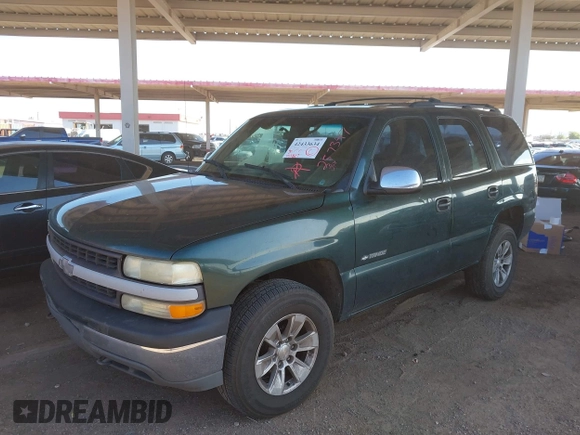 2002 Chevrolet Tahoe LT z VIN 1GNEK13ZX2J257347, wystawiony jako IAAI lot #42433634 z przebiegiem 252 817 mil mil oraz . Historia ofert i sprzedaży dostępna na DreamBid. Obrazek 2.