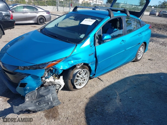 2022 Toyota Prius Prime LE with VIN JTDKAMFP3N3207926, listed as a IAAI auction lot 41276667 with 55,593 mi miles. Bid and sale history available at carsss.com. Image 17.