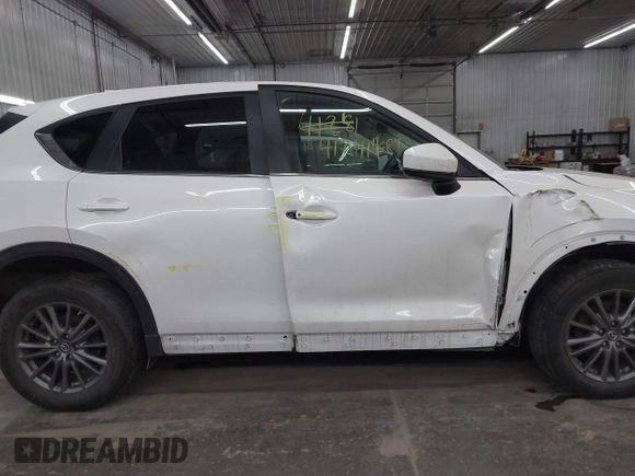 2017 Mazda CX-5 Touring with VIN JM3KFBCL9H0107589, listed as a IAAI auction lot 41241481 with 77,032 mi miles. Bid and sale history available at carsss.com. Image 13.