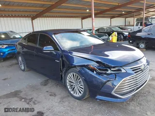 2019 Toyota Avalon Hybrid Limited with VIN 4T1B21FB5KU007633, listed as a IAAI auction lot 41615161 with 132,182 mi miles. Bid and sale history available at carsss.com. Image 6.