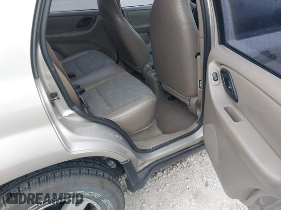 2001 Ford Escape with VIN 1FMUU01B61KE00524, listed as a IAAI auction lot 41486950 with 163,753 mi miles and . Bid and sale history available at DreamBid. Image 8.