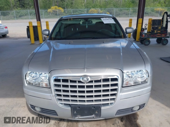 2005 Chrysler 300 Touring with VIN 2C3JA53G75H687752, listed as a IAAI auction lot 42190758 with 170,269 mi miles and . Bid and sale history available at DreamBid. Image 12.
