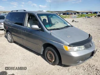 2001 Honda Odyssey EX z VIN 2HKRL18691H571178, wystawiony jako Copart lot #57343205 z przebiegiem 198 506 mil mil oraz Czysty tytuł • Clean title. Historia ofert i sprzedaży dostępna na DreamBid. Obrazek 4.