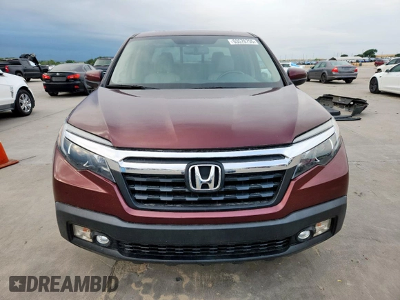 2019 Honda Ridgeline RTL-T with VIN 5FPYK2F60KB002573, listed as a Copart auction lot 63570755 with 111,388 mi miles and Salvage title. Bid and sale history available at DreamBid. Image 5.