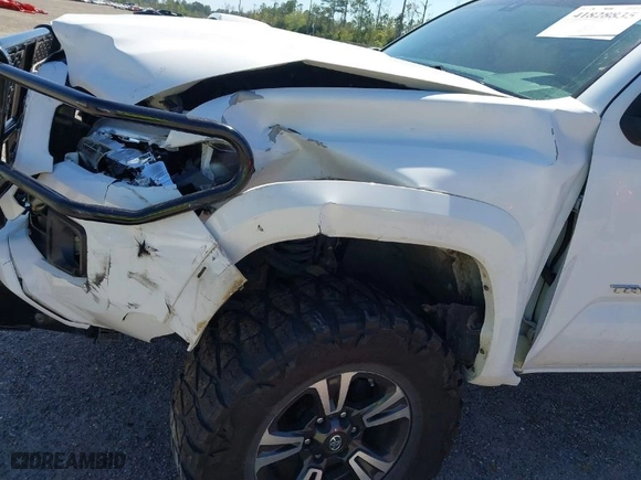 2019 Toyota Tacoma 4WD SR with VIN 3TMCZ5AN6KM229597, listed as a IAAI auction lot 41828835 with 134,907 mi miles. Bid and sale history available at carsss.com. Image 16.