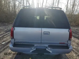 2000 GMC Denali z VIN 1GKEK13R9YR105616, wystawiony jako Copart lot #84221164 z przebiegiem 201 378 mil mil oraz Tytuł czysty. Historia ofert i sprzedaży dostępna na DreamBid. Obrazek 6.