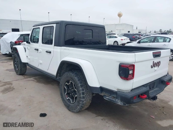 2020 Jeep Gladiator Rubicon with VIN 1C6JJTBG9LL171398, listed as a IAAI auction lot 41390927 with 42,812 mi miles. Bid and sale history available at carsss.com. Image 3.
