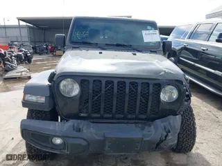 2021 Jeep Gladiator Willys with VIN 1C6HJTAG9ML559555, listed as a IAAI auction lot 41669066 with 74,799 mi miles. Bid and sale history available at carsss.com. Image 11.
