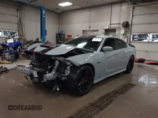 2021 Dodge Charger Scat Pack Widebody with VIN 2C3CDXGJ4MH540627, listed as a IAAI auction lot 41171991 with 31,394 mi miles and . Bid and sale history available at DreamBid. Image 2.