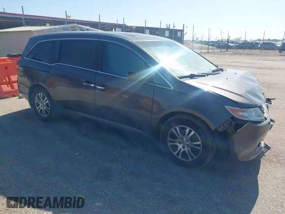 2012 Honda Odyssey EX-L with VIN 5FNRL5H61CB095789, listed as a IAAI auction lot 42065507 with 138,570 mi miles and . Bid and sale history available at DreamBid. Image 1.