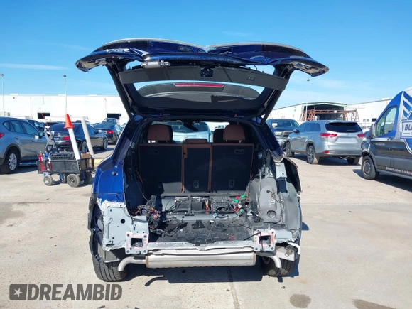 2023 Audi Q5 Premium Plus with VIN WA1BBAFYXP2195975, listed as a IAAI auction lot 41309879 with 11,124 mi miles and . Bid and sale history available at DreamBid. Image 6.