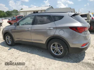 2018 Hyundai Santa Fe 2.4L with VIN 5XYZU3LB9JG563893, listed as a Copart auction lot 62058745 with 141,353 mi miles and Salvage title. Bid and sale history available at DreamBid. Image 2.