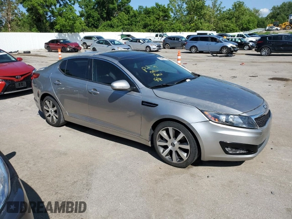 2012 Kia Optima SX z VIN 5XXGR4A64CG023279, wystawiony jako Copart lot #61482775 z przebiegiem 213 282 mil mil oraz Czysty tytuł • Clean title. Historia ofert i sprzedaży dostępna na DreamBid. Obrazek 4.