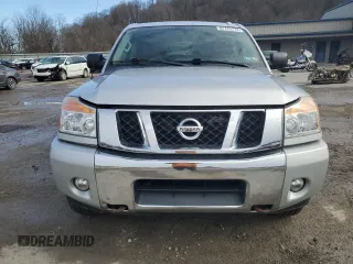 2015 Nissan Titan Pro-4X with VIN 1N6AA0EC1FN512072, listed as a Copart auction lot 85733174 with 92,460 mi miles and Salvage title. Bid and sale history available at DreamBid. Image 5.