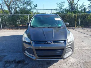 2016 Ford Escape SE with VIN 1FMCU9GX3GUB78749, listed as a IAAI auction lot 42030262 with 93,365 mi miles. Bid and sale history available at carsss.com. Image 12.