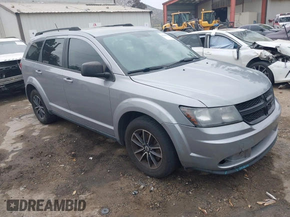 2018 Dodge Journey SE with VIN 3C4PDCAB1JT141295, listed as a IAAI auction lot 42098218 with 110,691 mi miles. Bid and sale history available at carsss.com. Image 1.