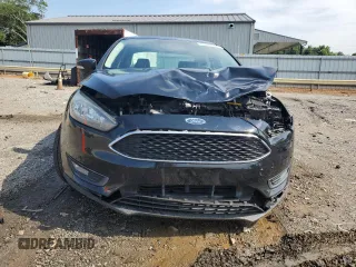 2016 Ford Focus SE with VIN 1FADP3F21GL228871, listed as a Copart auction lot 63506525 with 62,756 mi miles and Salvage title. Bid and sale history available at DreamBid. Image 5.