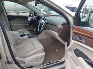 2014 Cadillac SRX Luxury Collection with VIN 3GYFNBE38ES518054, listed as a IAAI auction lot 41520886 with 108,905 mi miles and . Bid and sale history available at DreamBid. Image 5.