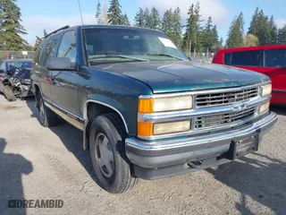 1998 Chevrolet Tahoe with VIN 1GNEK13R9WJ365044, listed as a IAAI auction lot 42042506 with 187,987 mi miles. Bid and sale history available at carsss.com. Image 6.