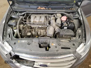 2014 Ford Taurus SEL z VIN 1FAHP2E85EG146469, wystawiony jako Copart lot #59506195 z przebiegiem 158 124 mil mil oraz Szkoda całkowita • Salvage title. Historia ofert i sprzedaży dostępna na DreamBid. Obrazek 11.