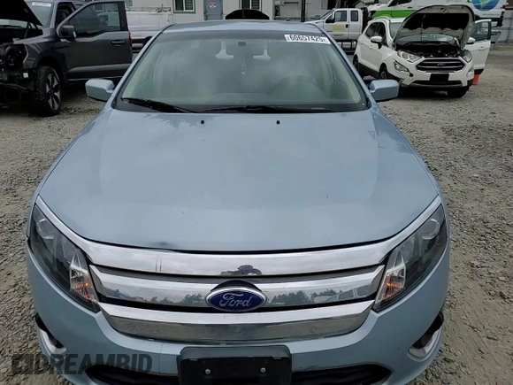 2011 Ford Fusion Hybrid with VIN 3FADP0L39BR274387, listed as a Copart auction lot 60657425 with 118,898 mi miles and Salvage title. Bid and sale history available at DreamBid. Image 13.