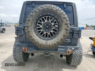2021 Jeep Wrangler Unlimited Rubicon with VIN 1C4HJXFG5MW542260, listed as a Copart auction lot 59476655 with 19,870 mi miles and Salvage title. Bid and sale history available at DreamBid. Image 6.