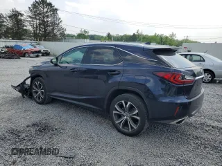 2018 Lexus RX 350 with VIN 2T2BZMCA6JC149235, listed as a Copart auction lot 59939505 with 214,676 mi miles and Salvage title. Bid and sale history available at DreamBid. Image 2.