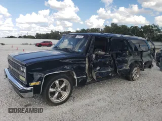 1989 Chevrolet Suburban with VIN 1GNER16K9KF194688, listed as a Copart auction lot 71224134 with 52,002 mi miles and Salvage Title. Bid and sale history available at carsss.com. Image 1.