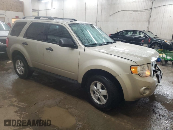2012 Ford Escape XLT with VIN 1FMCU9D76CKC44981, listed as a Copart auction lot 57908795 with 127,594 mi miles and Salvage title. Bid and sale history available at DreamBid. Image 4.