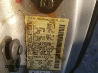 2005 Nissan Frontier SE z VIN 1N6AD06W75C445259, wystawiony jako Copart lot #88346765 z przebiegiem 126 706 mil mil oraz Szkoda całkowita • Salvage title. Historia ofert i sprzedaży dostępna na DreamBid. Obrazek 14.