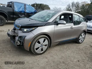2014 BMW i3 with VIN WBY1Z4C55EVX62872, listed as a Copart auction lot 88975135 with 49,841 mi miles and Salvage Title. Bid and sale history available at carsss.com. Image 1.