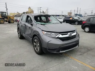 2017 Honda CR-V LX z VIN 2HKRW5H3XHH402429, wystawiony jako Copart lot #57440845 z przebiegiem 17 617 mil mil oraz Szkoda całkowita • Salvage title. Historia ofert i sprzedaży dostępna na DreamBid. Obrazek 14.